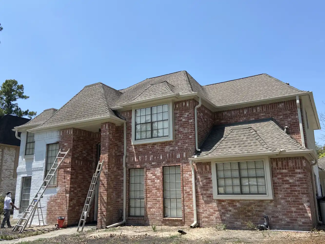Before and after exterior painting in The Woodlands, TX
